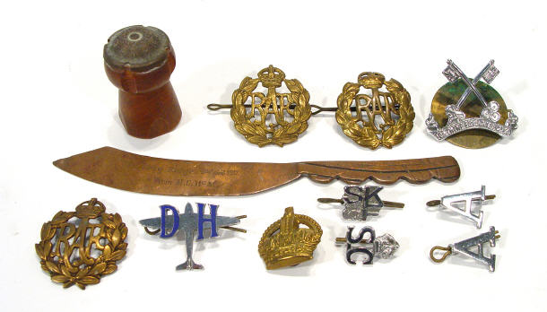 Appraisal: Collection of Military hat pins a copper trench art paper