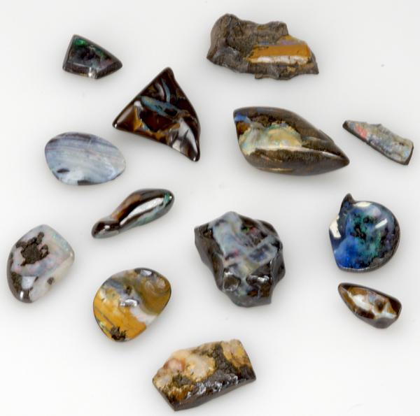 Appraisal: UNMOUNTED OPALS Thirteen stones boulder and matrix opals most polished