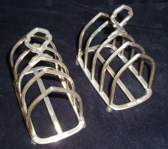 Appraisal: A pair of toastracks Goldsmiths Silversmiths Co Sheffield the divisions