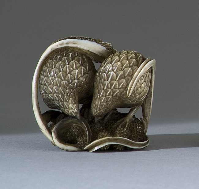 Appraisal: IVORY NETSUKE Late th CenturyIn the form of two quail