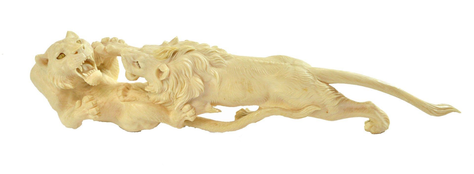 Appraisal: A Japanese ivory group of a lion and tiger fighting