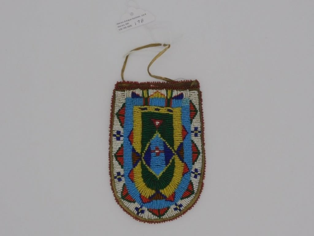 Appraisal: blue red and green geometric beading On one side if