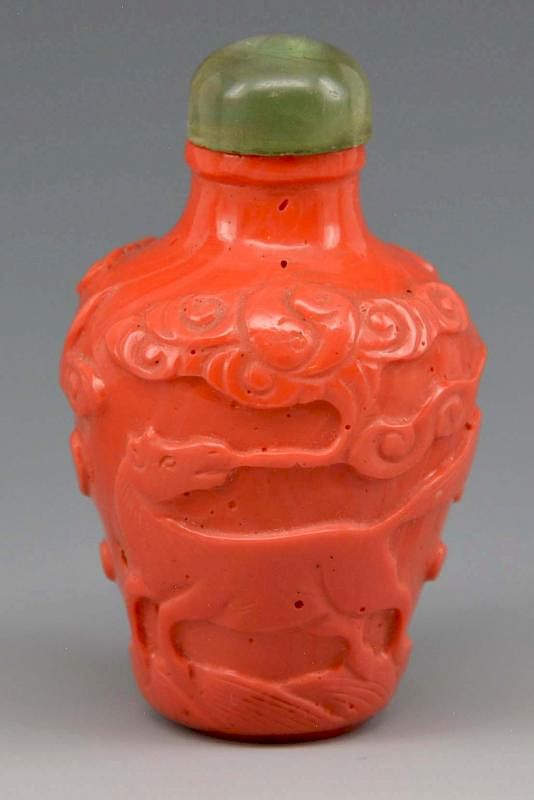 Appraisal: Chinese coral snuff bottle with carved horse Chinese coral snuff