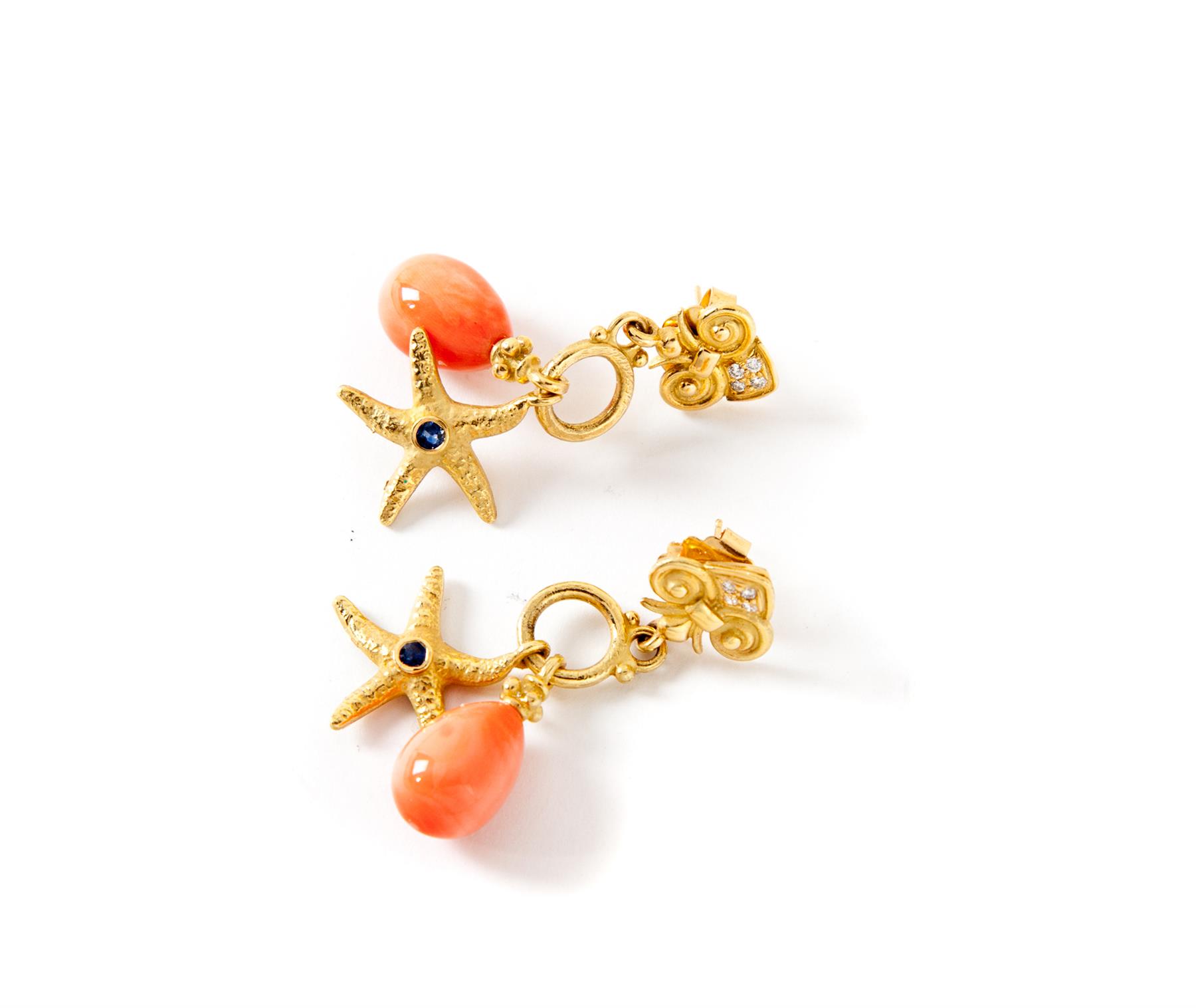 Appraisal: K GOLD AND CORAL DROP EARRINGS American st century Yellow