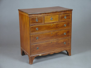 Appraisal: An early th century mahogany and inlaid chest of drawers