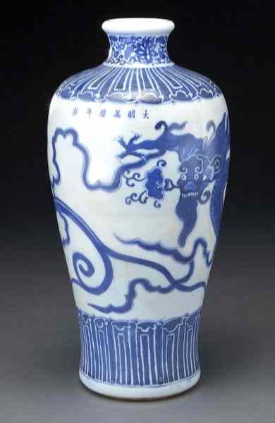 Appraisal: Chinese Qing Kangxi blue and white porcelain vasedepicting dragons in