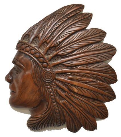 Appraisal: Folk art carved hanging profile Indian Chief signed Paul or