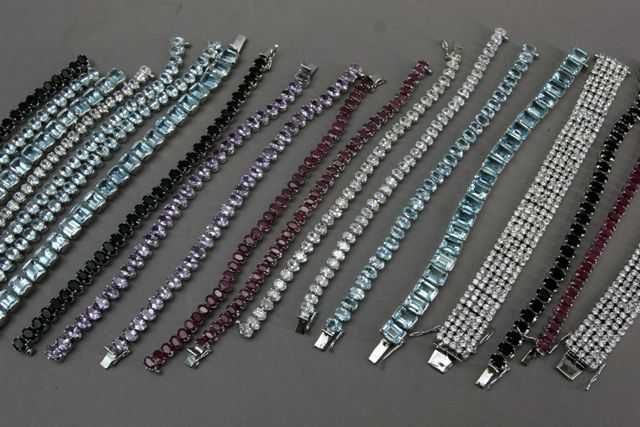 Appraisal: Twenty bracelets set with coloured stones including topaz and amethyst