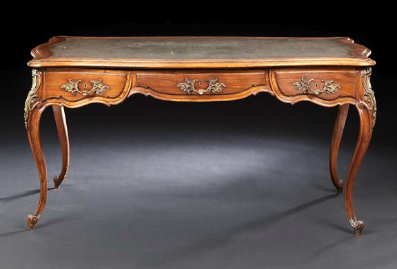 Appraisal: Louis XV-Style Fruitwood Writing Table early th century the shaped