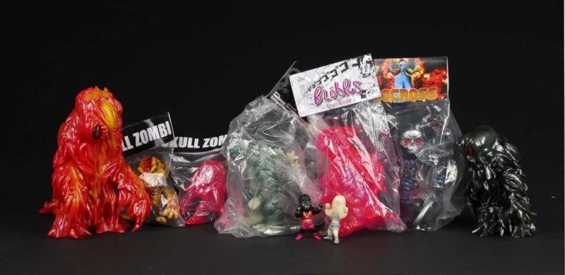 Appraisal: Lot of Vinyl Figures Description Japanese CCP Skull Zombi Blobpus