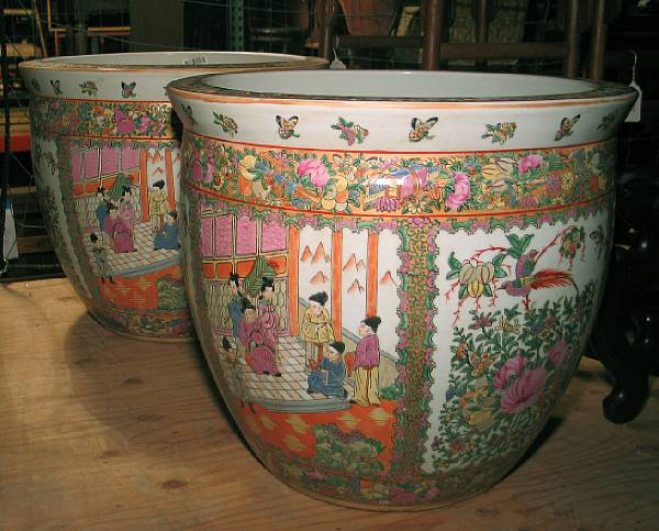 Appraisal: Two large enameled porcelain fish bowl planters Decorated in the