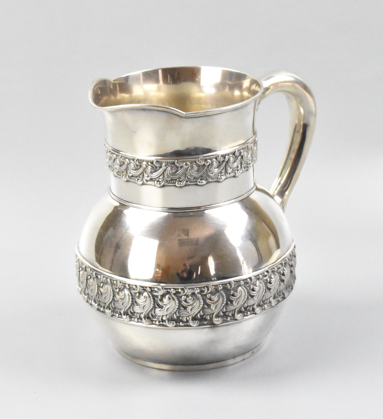 Appraisal: An antique Tiffany Co sterling silver pouring jug Wide base