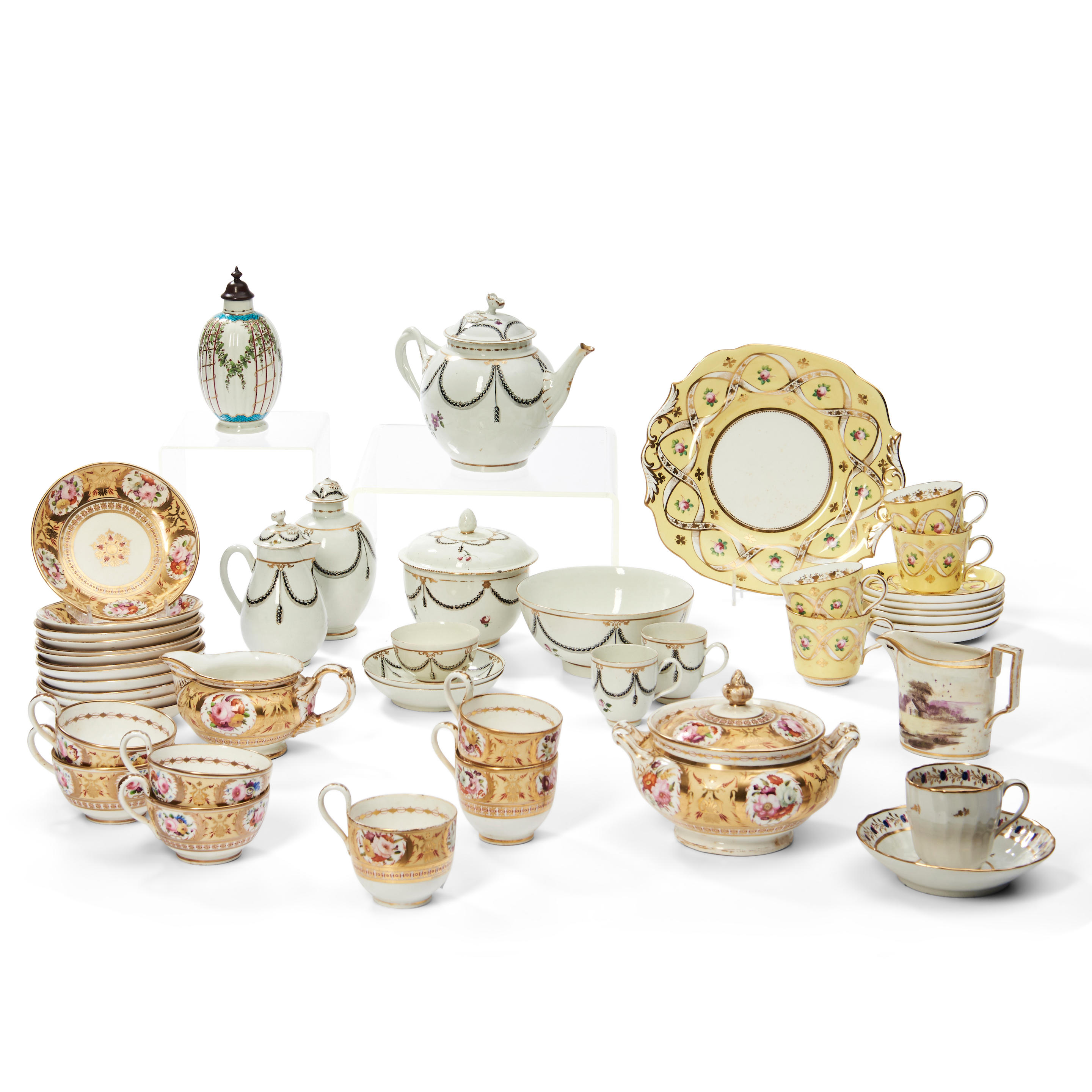 Appraisal: APPROXIMATELY FORTY PIECES OF ENGLISH PORCELAIN TEAWARE including yellowware teacups