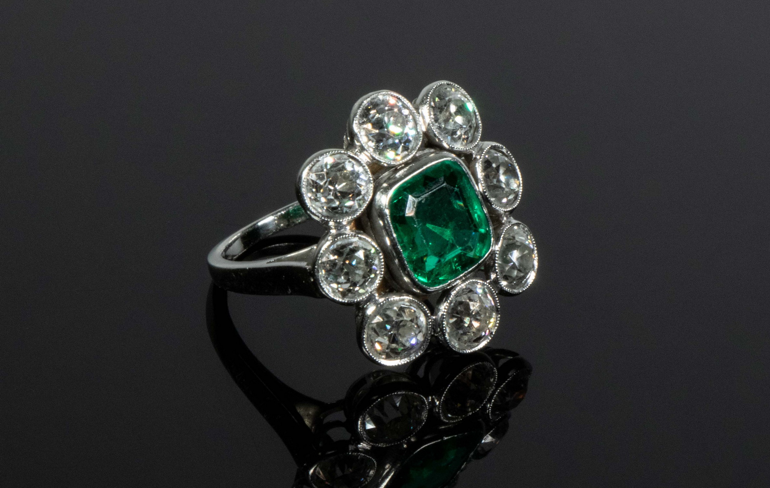 Appraisal: LADIES VINTAGE PLATINUM EMERALD AND DIAMOND RING Handmade set with