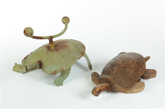 Appraisal: TWO TURTLES American th century Tin lawn sprinkler with worn