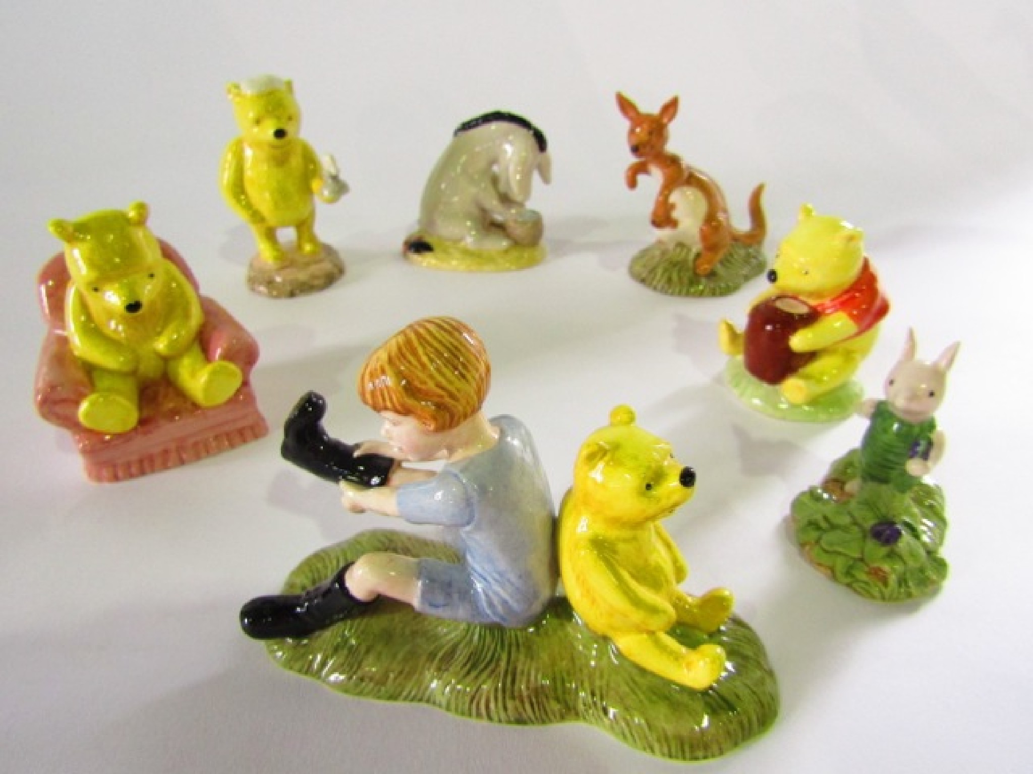 Appraisal: A collection of Royal Doulton figures from the Winnie the