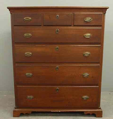 Appraisal: Pennsylvania Chippendale cherry three-quarter high case circa with three small