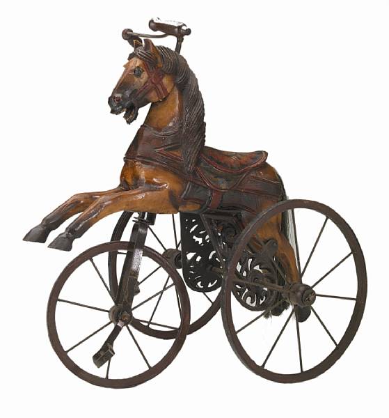 Appraisal: A th century reproduction of a toy tricycle height in