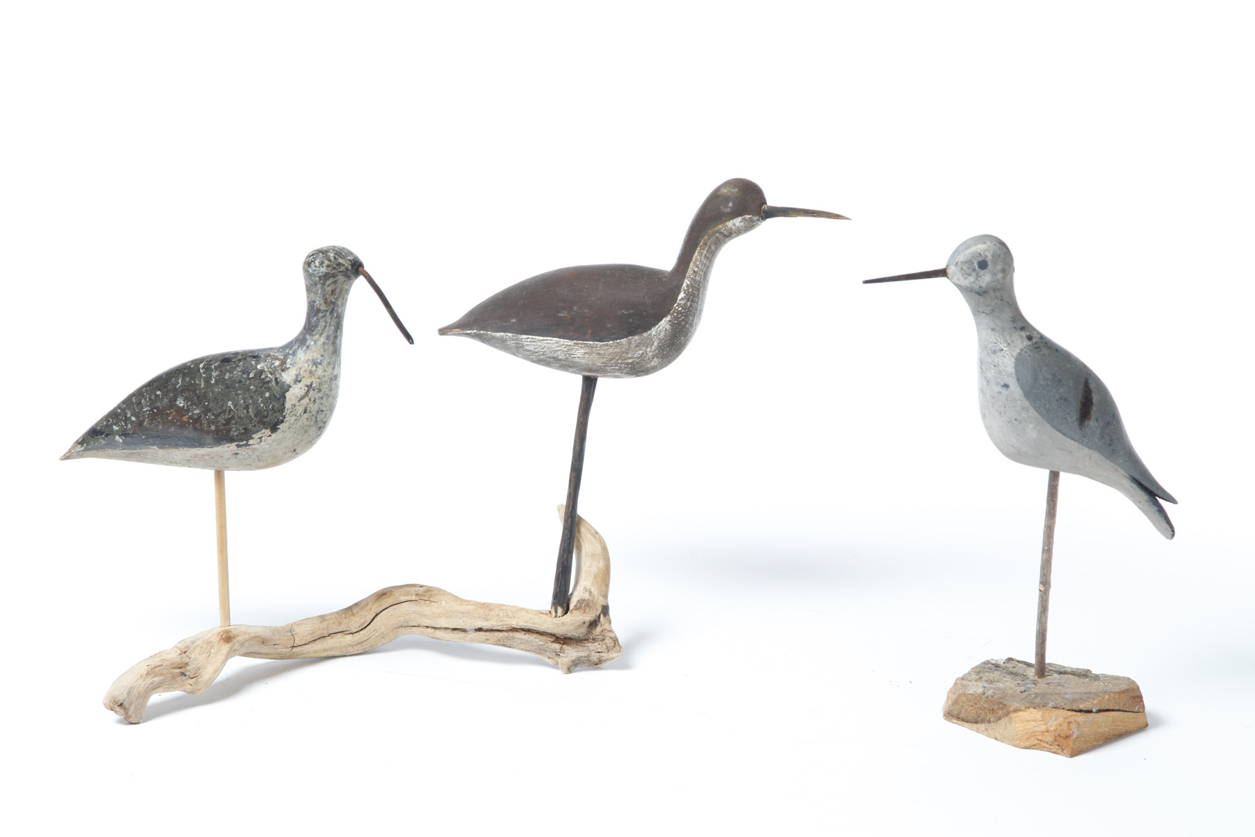 Appraisal: THREE SHOREBIRD DECOYS American mid th century One with old