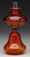 Appraisal: RARE DEEP AMBER MINI LAMP H - Deep amber glass