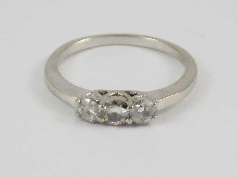 Appraisal: THREE-STONE DIAMOND AND WHITE GOLD RING The k white gold