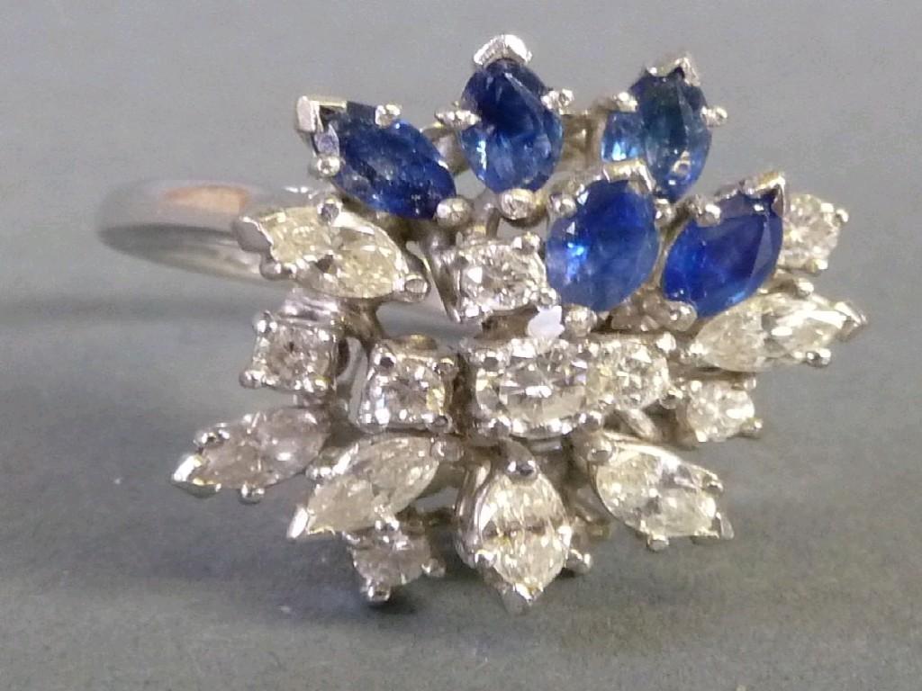 Appraisal: ct WHITE GOLD SAPPHIRE AND DIAMOND COCKTAIL RING set with