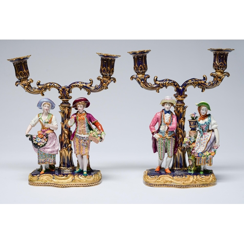 Appraisal: A pair of Minton Double Figure candlesticks or candelabra c