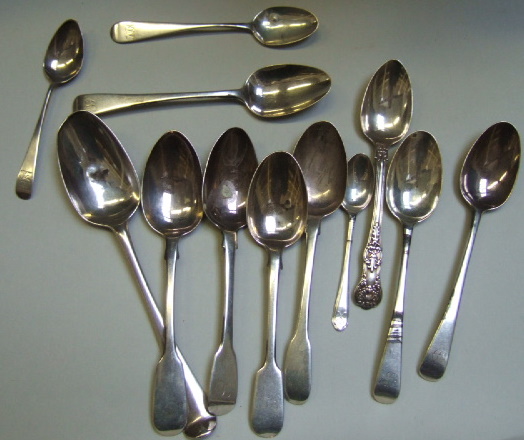 Appraisal: Three silver Old English pattern dessert spoons London four silver