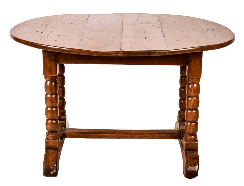 Appraisal: CONTINENTAL WALNUT BREAKFAST TABLECondition slight warping to top Provenance The