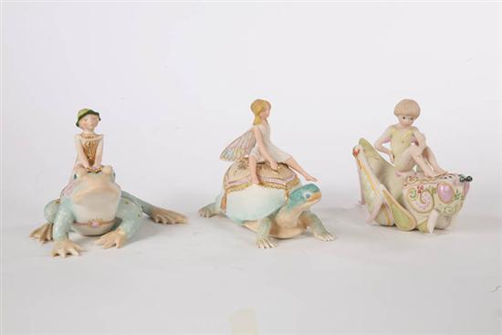 Appraisal: THREE CYBIS FIGURES Tiffin boy fairy on a frog h