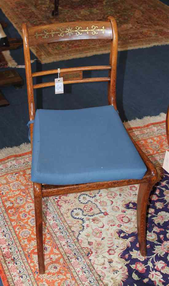 Appraisal: A set of four Regency brass inlaid beech dining chairs