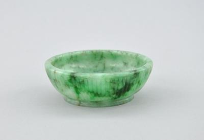 Appraisal: A Carved Green Jade Dish Carved as a low dish