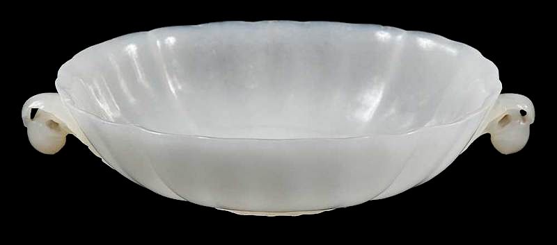 Appraisal: White Jade Mughal Style Carved Dish Chinese Qing dynasty delicately