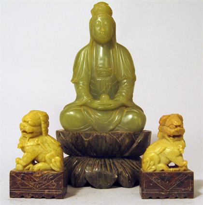 Appraisal: Chinese jadeite Quanyin model and two soapstone Fu dogs th