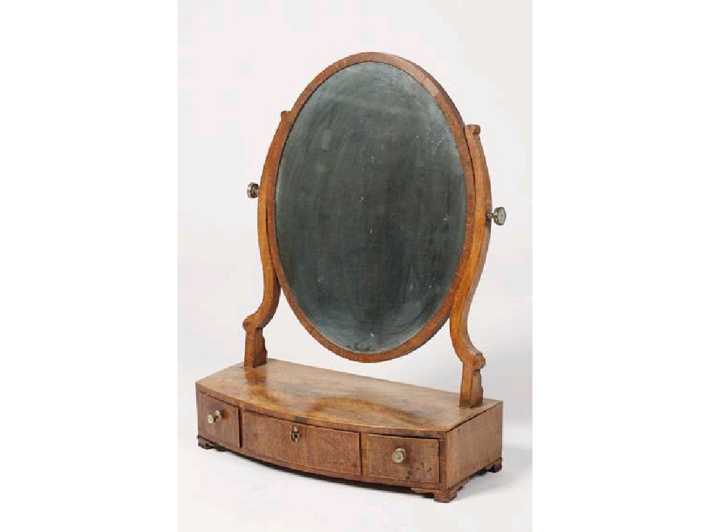 Appraisal: A GEORGE III MAHOGANY DRESSING TABLE MIRROR the oval plate