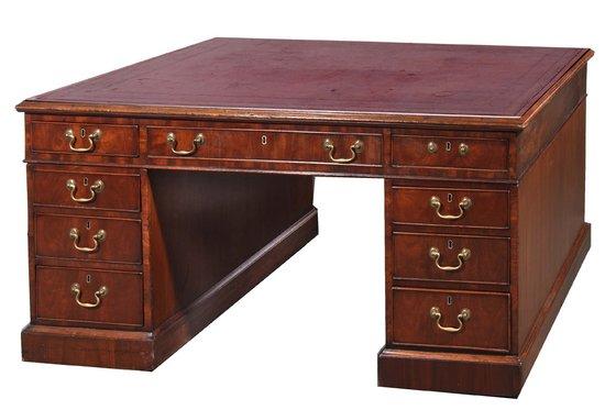 Appraisal: A GEORGE III MAHOGANY PARTNERS DESK with rectangular inset red