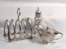 Appraisal: A hexagonal silver pepper and matching silver mustard pot by