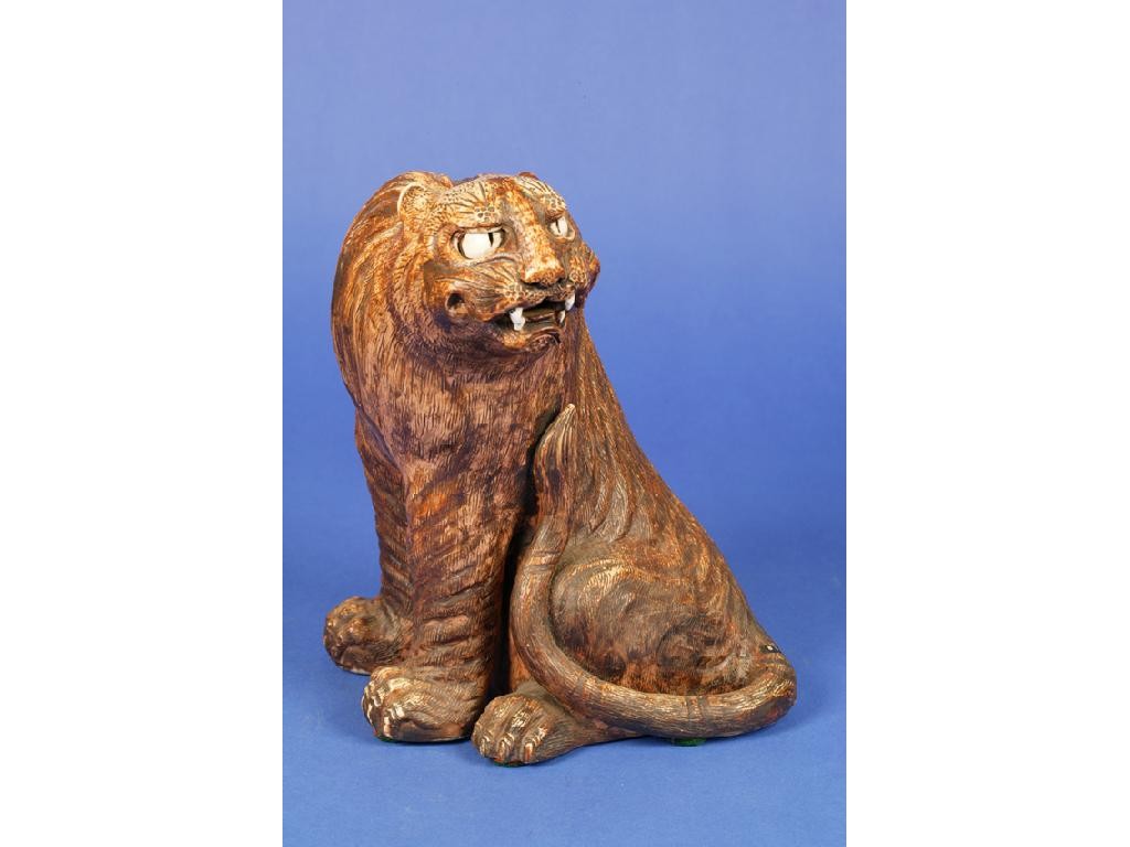 Appraisal: A JAPANESE PORCELAIN FIGURE OF A SEATED TIGER with an