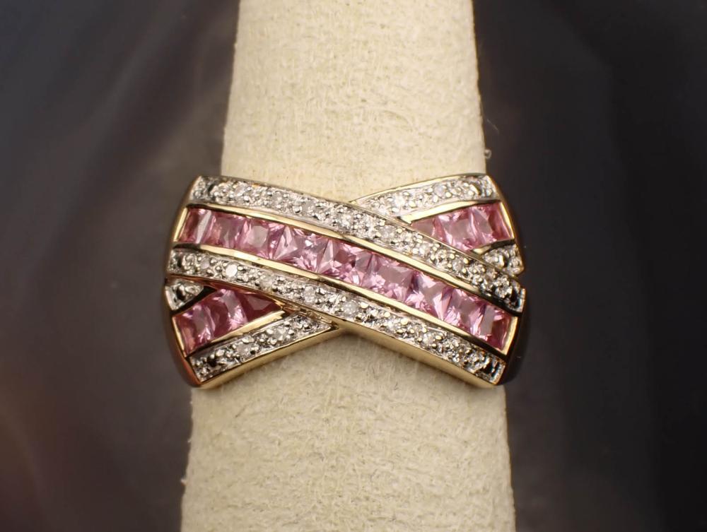 Appraisal: PINK SAPPHIRE DIAMOND AND FOURTEEN KARAT GOLD RING The yellow