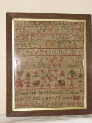 Appraisal: A SAMPLER by Elizabeth Wetherell worked in full cross stitch