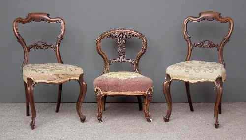 Appraisal: A pair of Victorian rosewood drawing room chairs with shaped