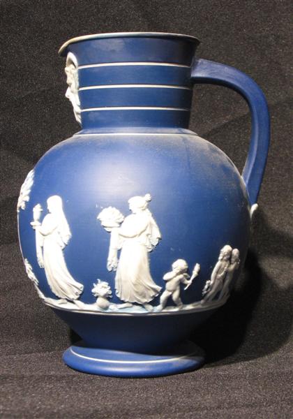 Appraisal: Wedgwood blue jasperware mask decorated pitcher H in PROVENANCE The