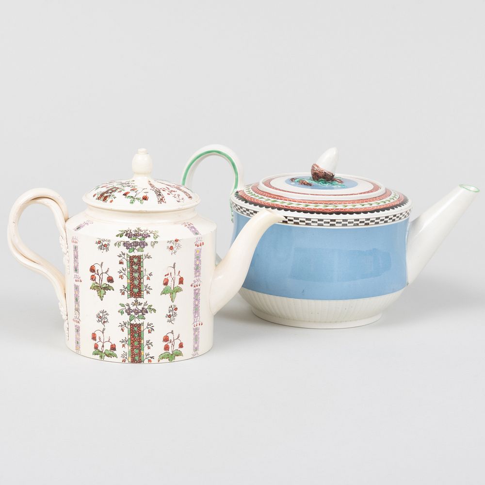 Appraisal: Two English Creamware Teapots The larger in wide over handle