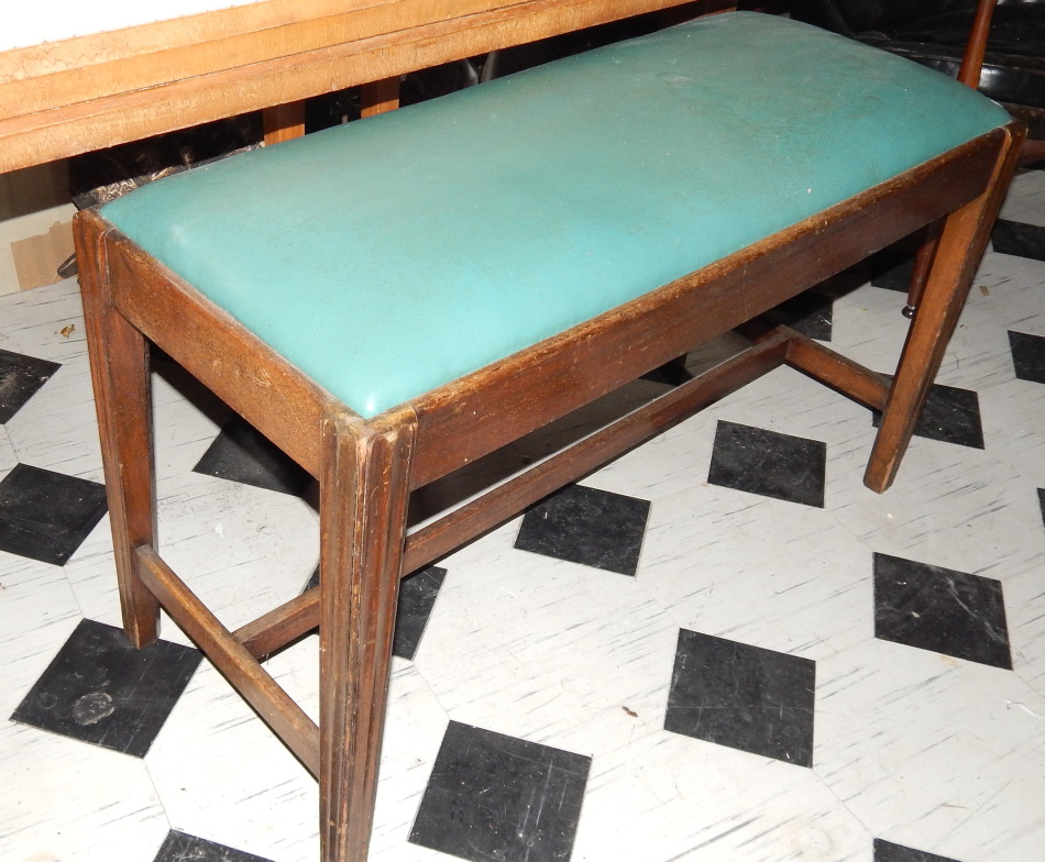 Appraisal: A George III mahogany stool with a green leather seat