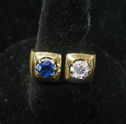 Appraisal: Diamond and sapphire white gold ring Round cut diamond and