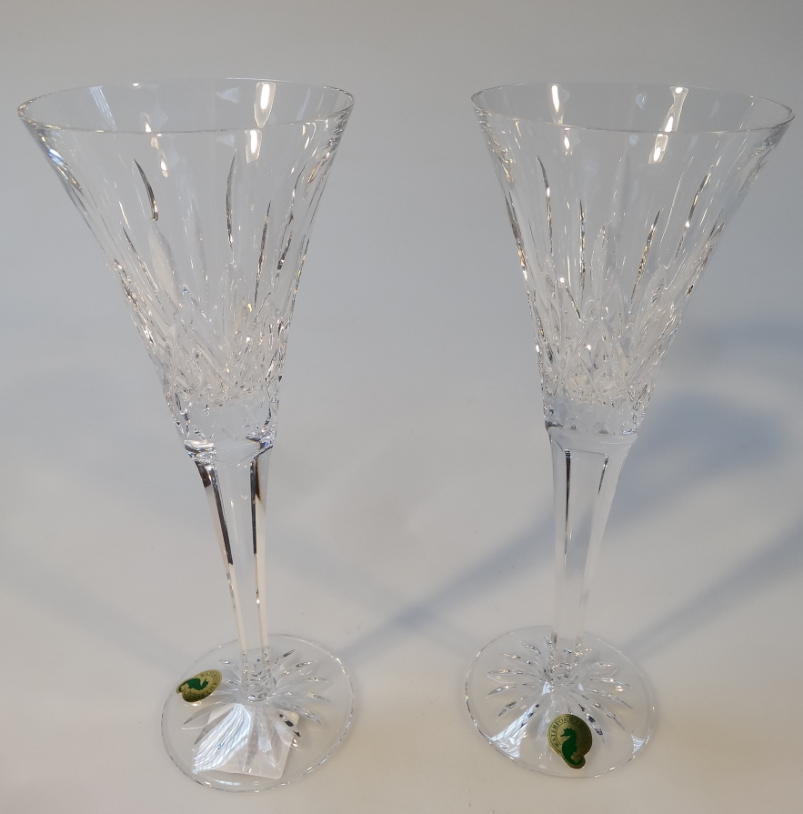 Appraisal: A pair of Waterford crystal Lismore toasting flutes with bell