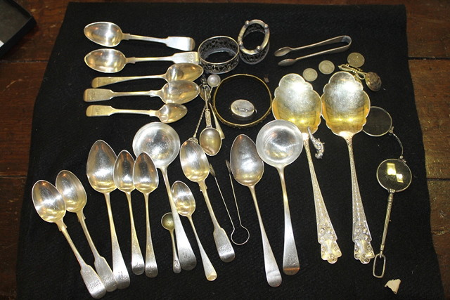 Appraisal: A PAIR OF GEORGIAN STYLE SILVER SPOONS with gilt bowls