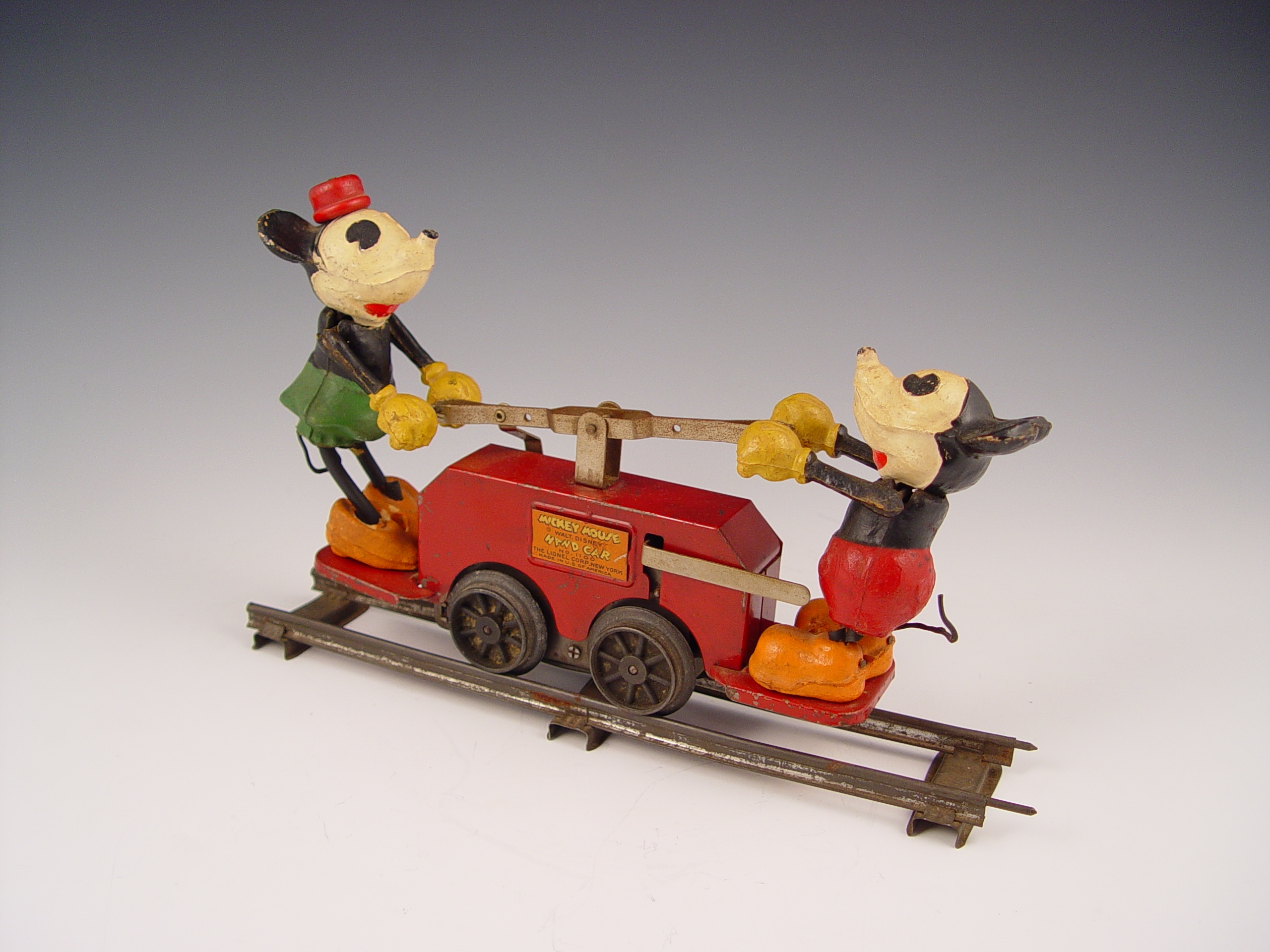 Appraisal: 's LIONEL MICKEY MOUSE HAND CAR Circa 's key wound