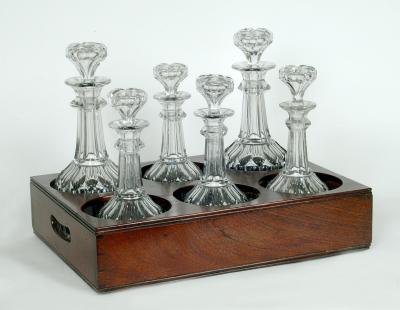 Appraisal: A MAHOGANY BOTTLE CARRIER early th century of oblong box