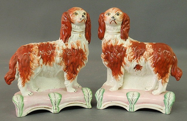 Appraisal: Very rare pair of Staffordshire red and white spaniels standing